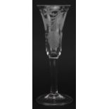 Eighteenth century ale glass with folded foot etched with leaves, 19.5cm high For further
