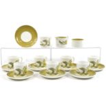 Set of eight Susie Cooper Sunflower pattern cups and saucers with milk jug and sugar bowl, the