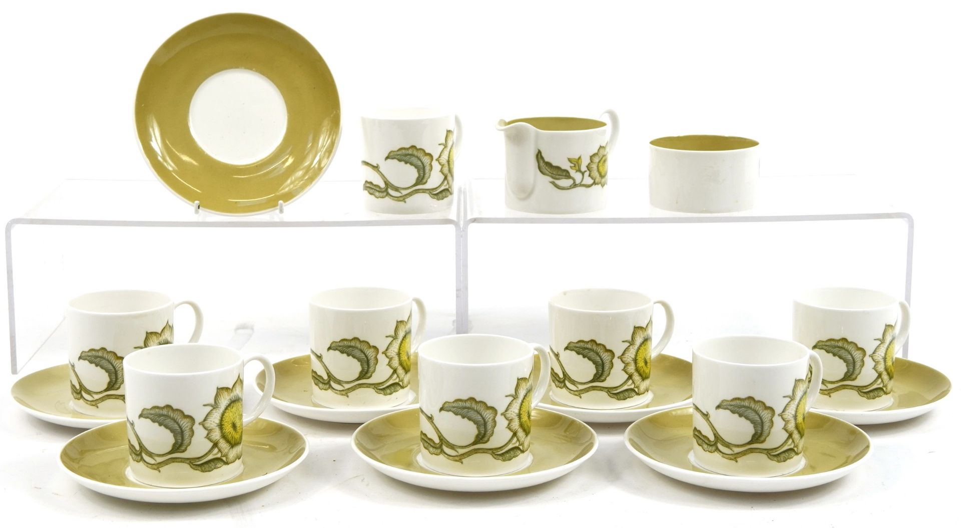Set of eight Susie Cooper Sunflower pattern cups and saucers with milk jug and sugar bowl, the