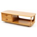 Ercol Minerva 844 light elm and beech coffee table with frieze drawer, 40.5cm H x 125cm W x 52.5cm D