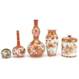 Japanese Kutani and Satsuma pottery comprising three vases, cylindrical pot and cover and bowl