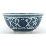 Chinese Islamic blue and white porcelain bowl hand painted with flower heads amongst scrolling