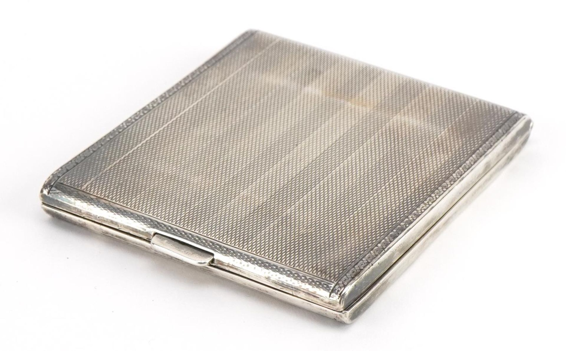 Art Deco rectangular silver cigarette case with engine turned decoration and gilt interior, J H W - Image 5 of 5
