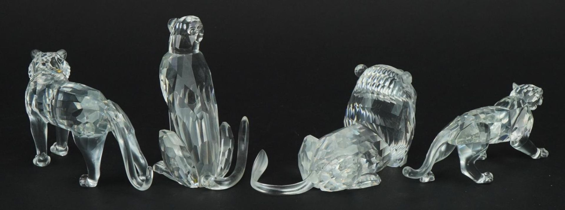 Four Swarovski Crystal big cats including lion and tiger, the largest 14cm in length For further - Image 2 of 4