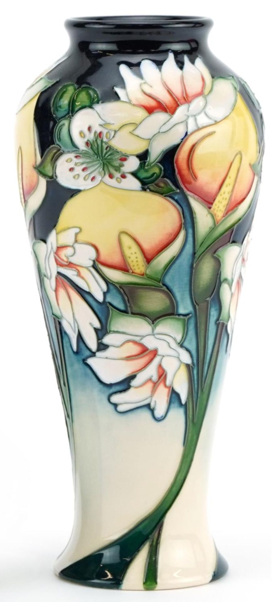 Moorcroft pottery vase hand painted with stylised flowers, dated 2010 to the base, 20.5cm high For