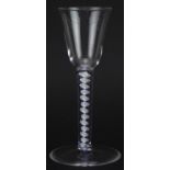 Eighteenth century wine glass with multi coloured opaque twist stem, 15.5cm high For further