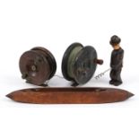 Wooden sundry items including two wooden fly fishing reels and a Black Forest figural corkscrew, the