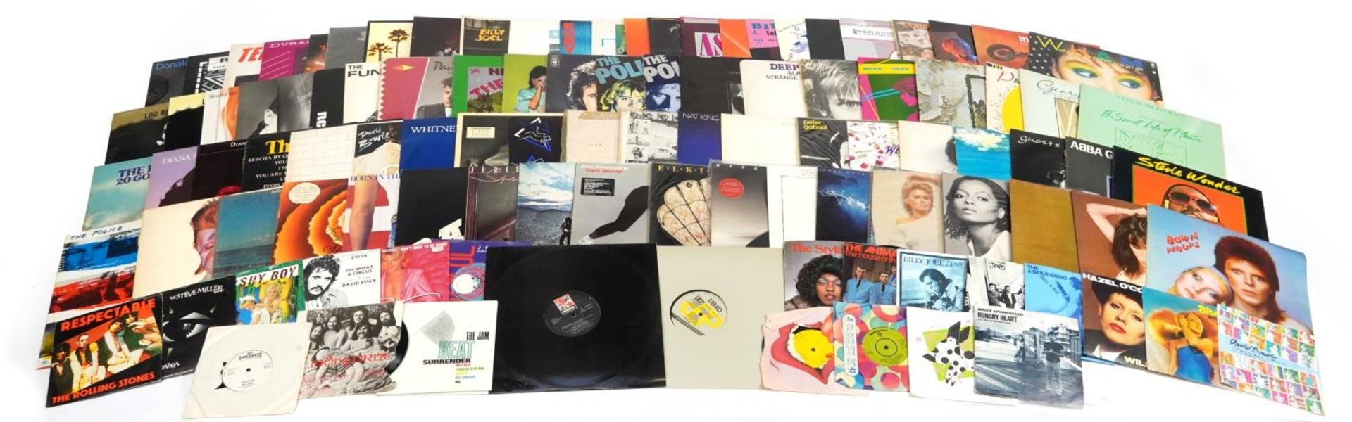 Vinyl LP records and 45rpms including The Jam, Lindis Farne, Stevie Wonder, Diana Ross, Elton