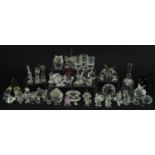 Collection of mostly Swarovski Crystal animals and figures including seated rag doll, birds, fish,