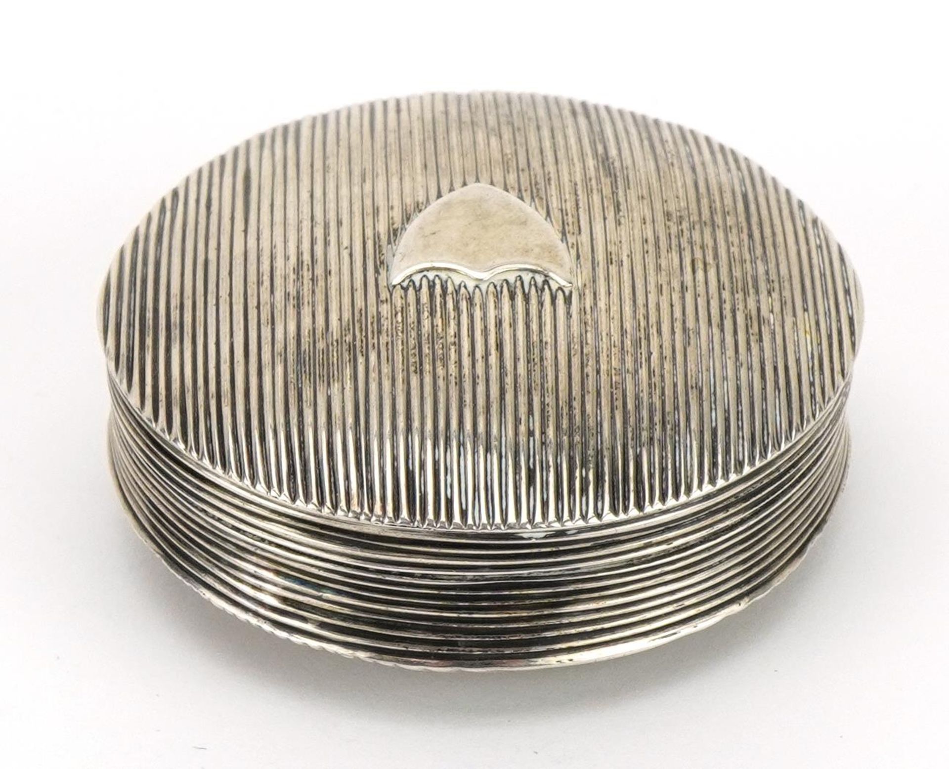 Circular Dutch silver pill box with engine turned decoration, impressed marks to the interior, 5cm - Image 2 of 4