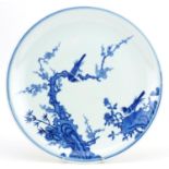 Large Chinese porcelain blue and white dish hand painted with birds amongst flowers, six figure
