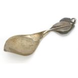Naturalistic modernist silver caddy spoon, C F maker's mark, Sheffield 1992, 10.2cm in length, 18.0g