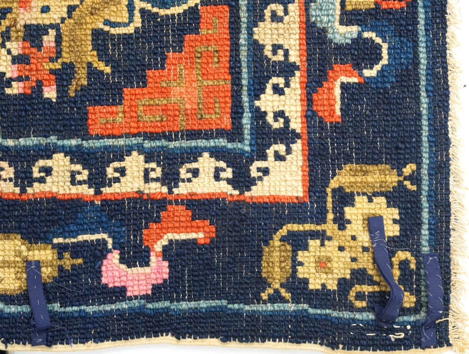 Chinese blue ground fireplace rug decorated with Daoist emblems and flowers, 120cm x 53cm For - Image 4 of 4