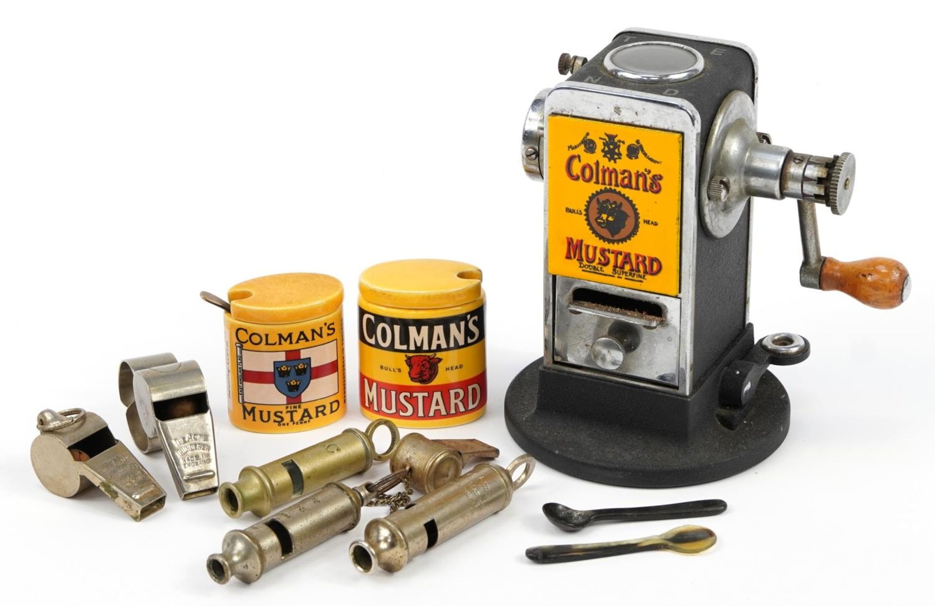 Vintage enamelled Coleman's Mustard pencil sharpener, mustard jars and whistles including The Acme