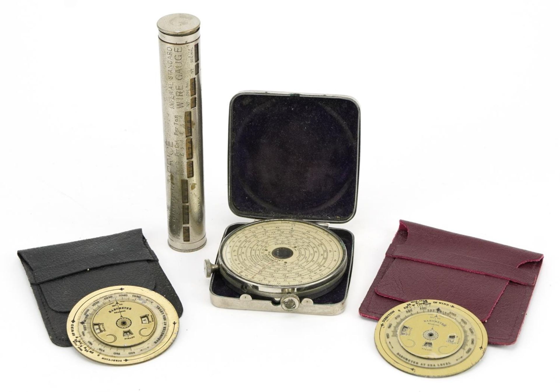Objects including Fowler's long scale calculator with tin case and an Aston Chain & Hook Co Ltd