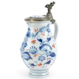 German porcelain jug with pewter lid having inset porcelain panel hand painted with flowers For