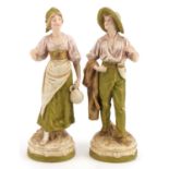 Royal Dux, pair of Art Nouveau Czechoslovakian figures of peasants numbered 1455 and 1456, the