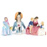 Two Royal Doulton figurines and a Victorian porcelain half pin doll, including Bedtime Story