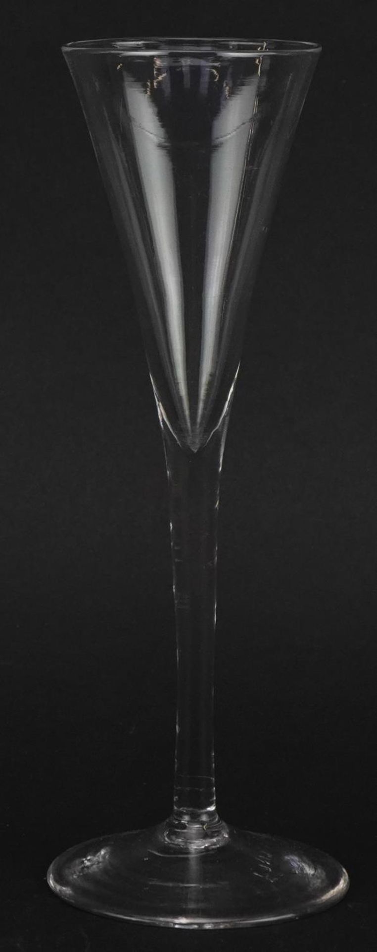Eighteenth century toasting glass, 19cm high For further information on this lot please contact