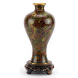 Chinese cloisonne baluster vase on hardwood stand enamelled with flowers, overall 24cm high For