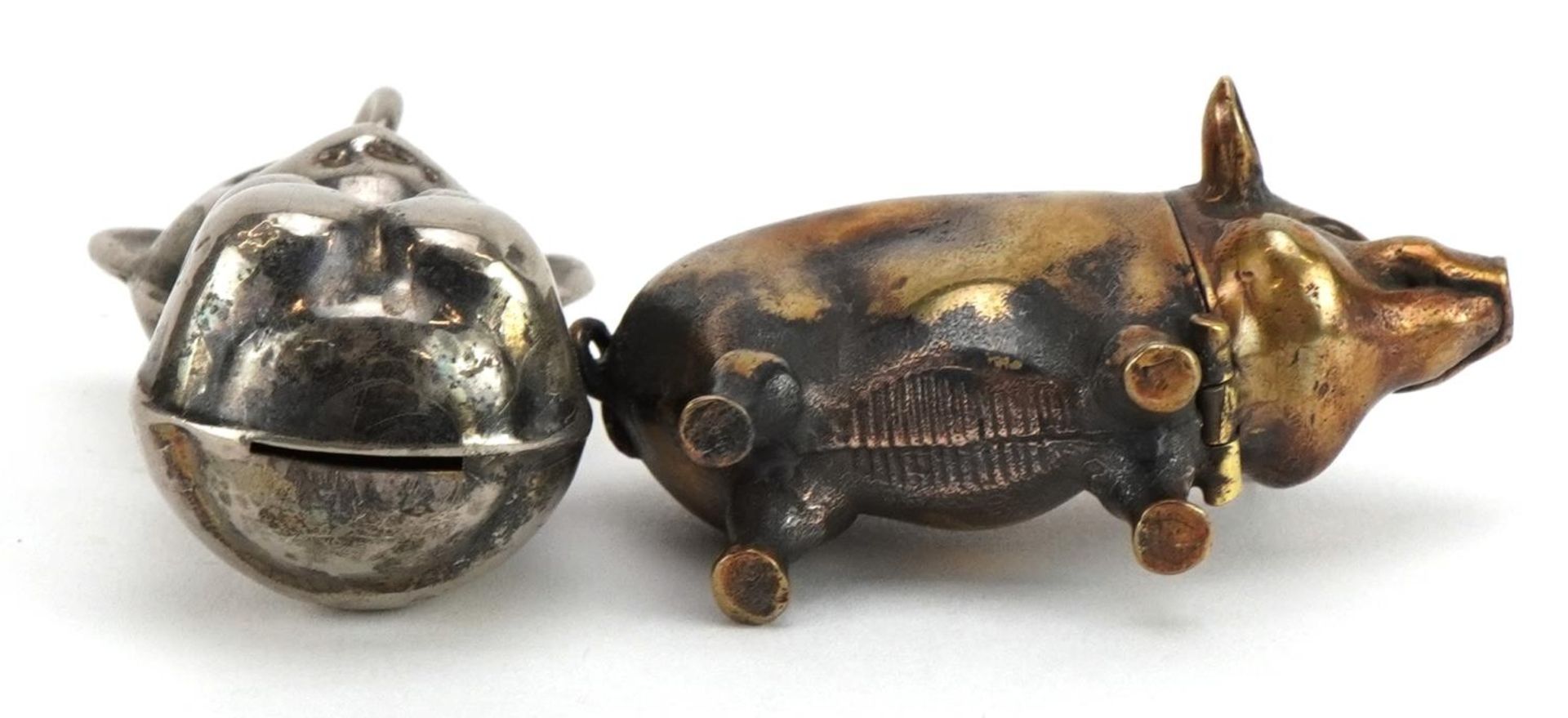 Novelty brass vesta case in the form of a pig and a silver plated baby's rattle in the form of a - Image 3 of 3