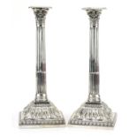 William Watkins, pair of George III silver Corinthian column candlesticks, London 1766, 31cm high,
