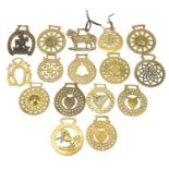 19th century horse brasses including John Peel and horse design examples, the largest 11cm high