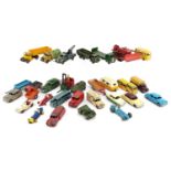 Vintage Dinky Toys diecast vehicles including racing cars, trucks, buses, vans, bulldozer and