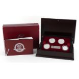 Footballing interest silver four coin collection housed in a wooden case honouring the FIFA