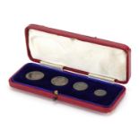 George V 1911 Maundy four coin set housed in a silk and velvet lined fitted tooled leather case