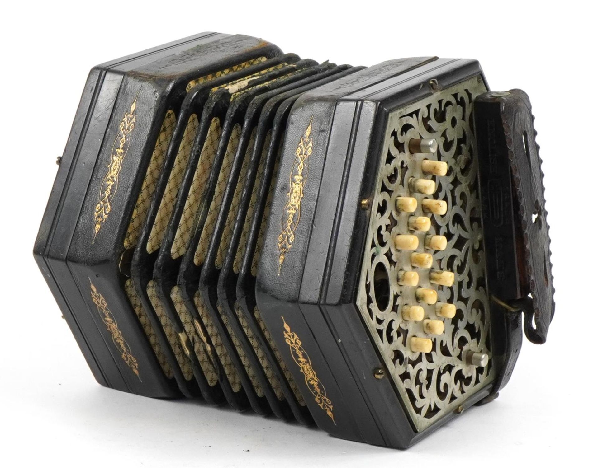 Victorian ebonised thirty two button concertina with pierced metal end plates and velvet lined case, - Bild 2 aus 4