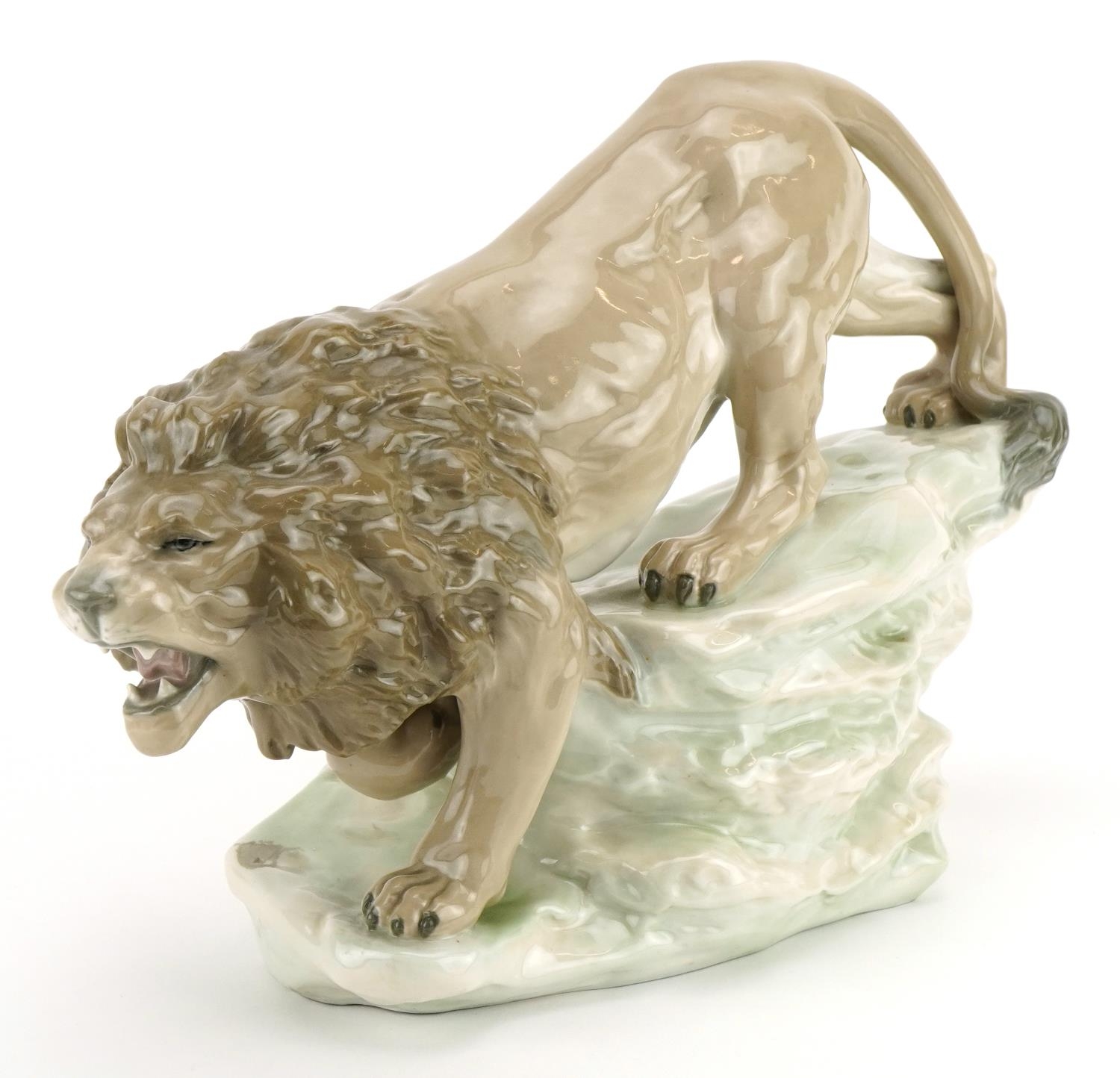 Amphora, large Czechoslovakian Art Nouveau model of a lion on a rock, numbered 828025 to the base,