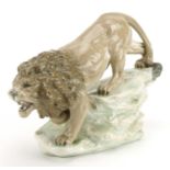 Amphora, large Czechoslovakian Art Nouveau model of a lion on a rock, numbered 828025 to the base,