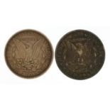 Two United States of America silver dollars comprising dates 1880 and 1883 For further information