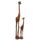 Large floor standing wooden giraffe and calf, the largest 155cm high For further information on this