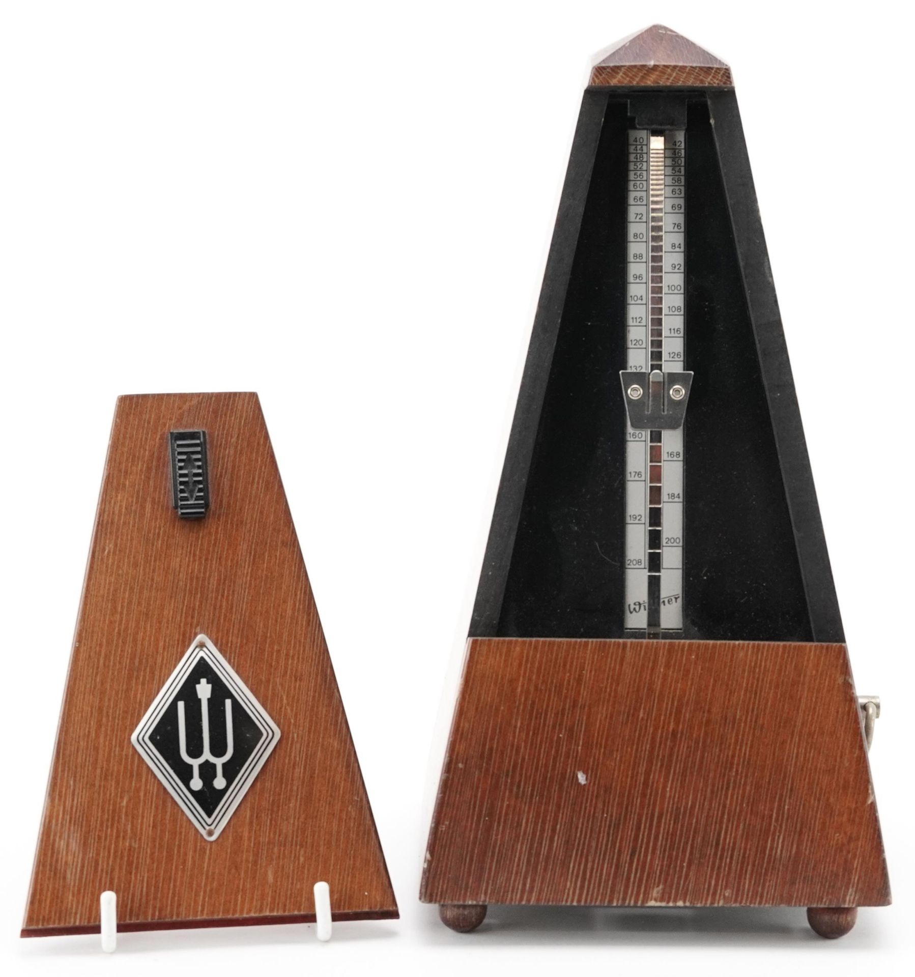 Wooden cased metronome made in Denmark, 22cm high For further information on this lot please contact