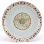 Chinese porcelain dish finely hand painted in the famille rose palette with flowers, six figure