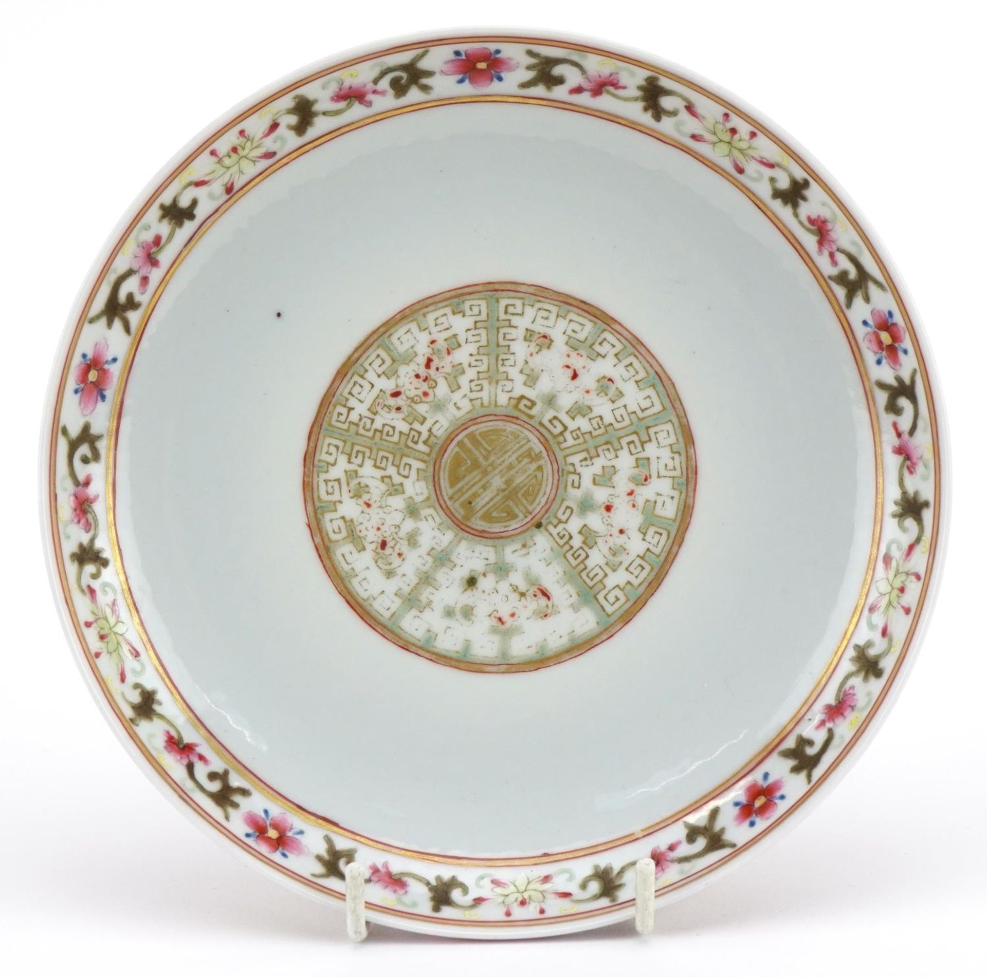 Chinese porcelain dish finely hand painted in the famille rose palette with flowers, six figure