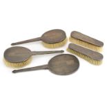 W I Broadway & Co, silver five piece dressing table set comprising two pairs of brushes and hand