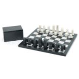 Black slate and white marble chess set with board, the largest piece 4.5cm high, the board 22cm x