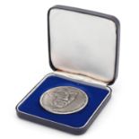 Gerhard Domagk Nobel Prize silvered medal by Gedoc, the fitted case numbered 666, 5cm in diameter,