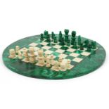 Circular malachite and onyx chess set with chess pieces, the largest chess pieces each 6cm high, the