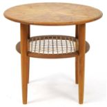 Lightwood occasional table with cane under tier, 48.5cm high x 55cm in diameter For further