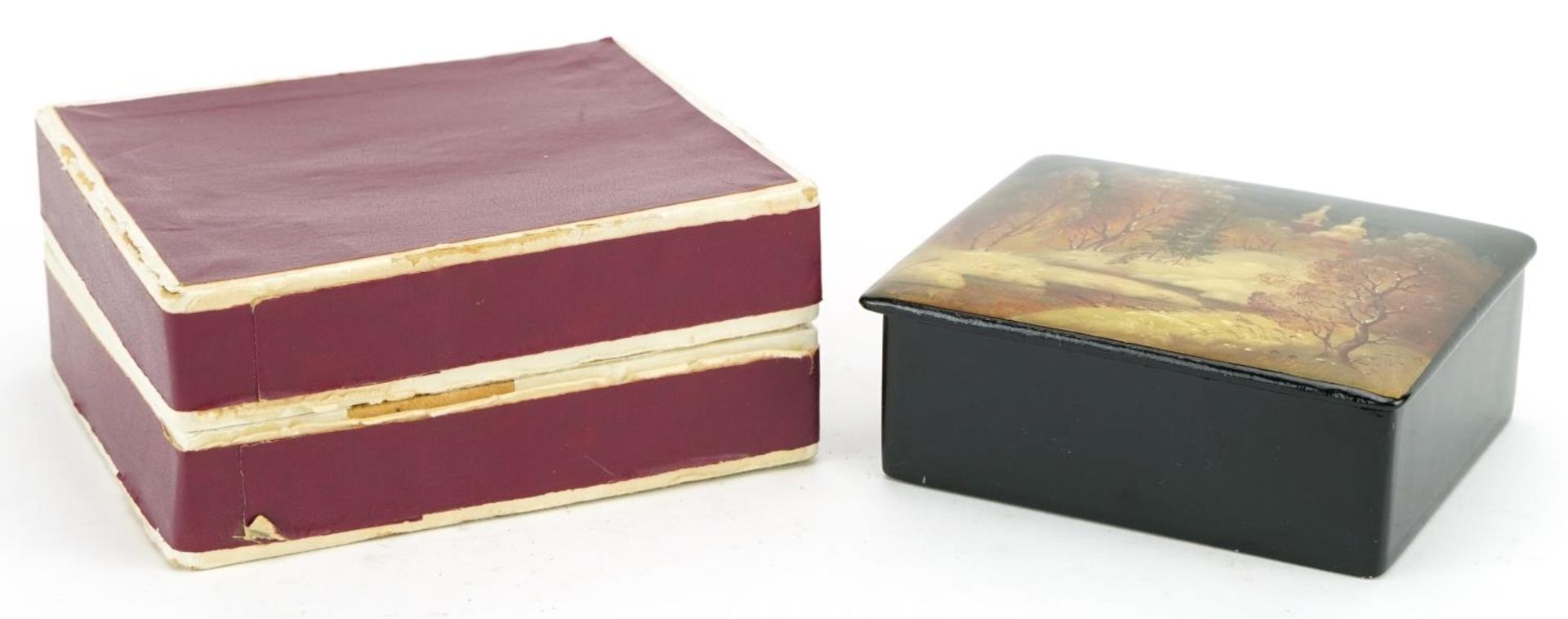 Russian lacquered casket with box and hinged lid, hand painted with a snowy landscape,