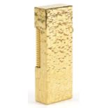 Dunhill gold plated bark design pocket lighter with case For further information on this lot