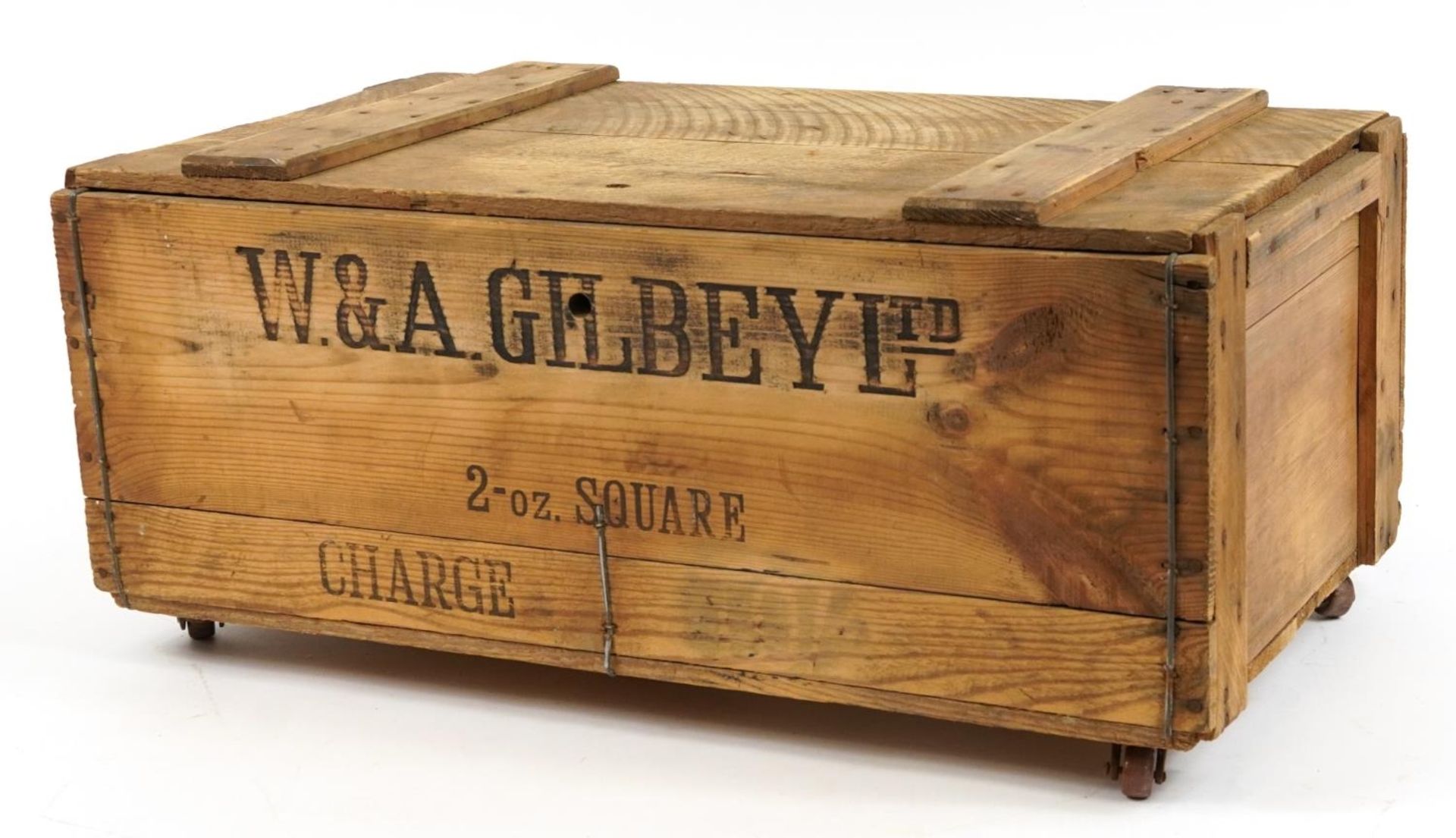 W & A Gilbey Ltd, Vintage Whisky pine advertising crate on metal casters, 26cm H x 66.5cm W x 37cm D