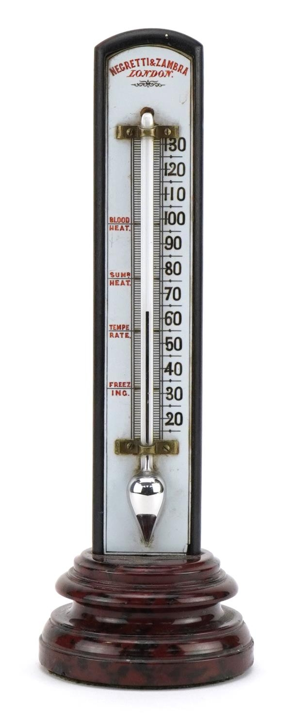 Negretti & Zambra of London desk thermometer with circular serpentine marble base, 22.5cm high For
