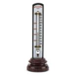 Negretti & Zambra of London desk thermometer with circular serpentine marble base, 22.5cm high For