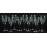 Nine Edinburgh Crystal wine glasses, the largest each 18cm high For further information on this