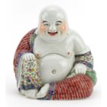 Chinese porcelain figure of Buddha hand painted in the famille rose palette, impressed character